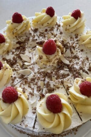 Carrot Cheesecake with Pecans, Almonds and Raspberries